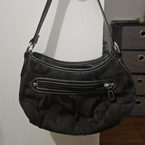 Coach Purse, Michael Kors Purse, and a Chicago Bears coat